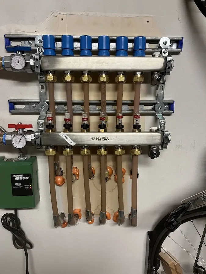 Plumber performing Water Heater Repair at a residential property in Indian River Estates